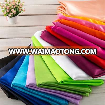 Wholesale high quality soft shiny smooth cheap polyester satin fabric with 700 colors